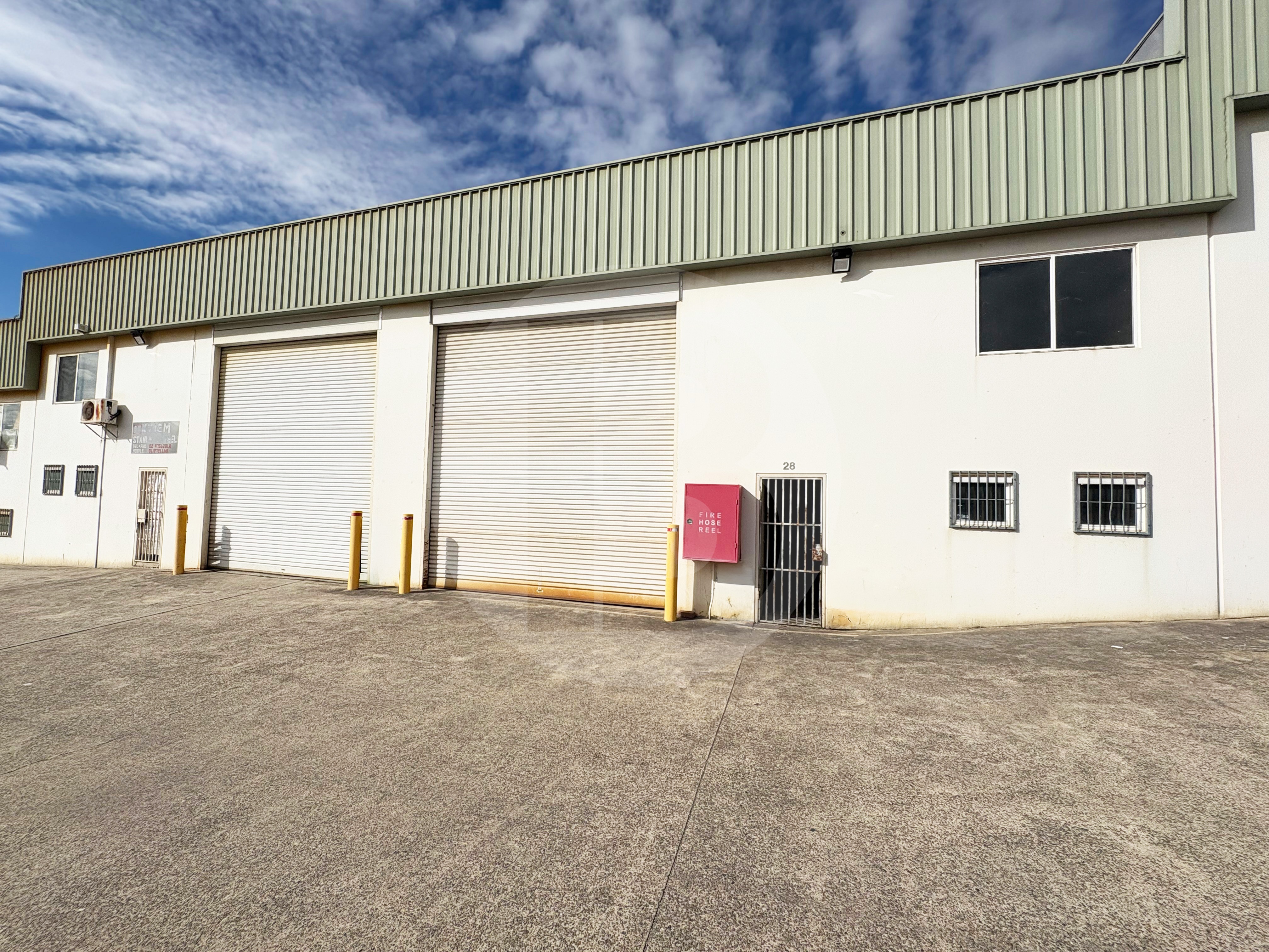 Functional Warehouse with Dual Driveway Access